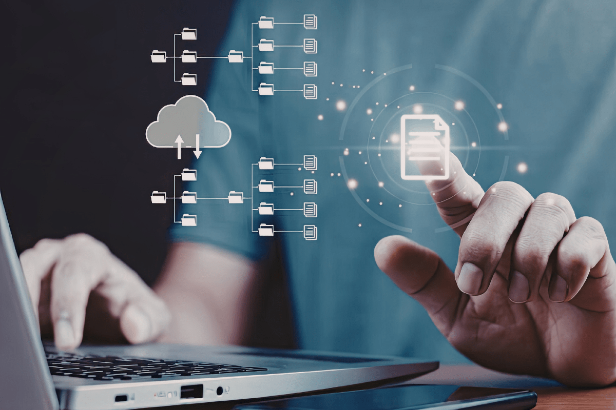 Calgary business professional working with cloud-based tools and dashboards on a laptop in a modern office environment representing PCe Solutions cloud services and managed cloud solutions for Calgary Alberta businesses