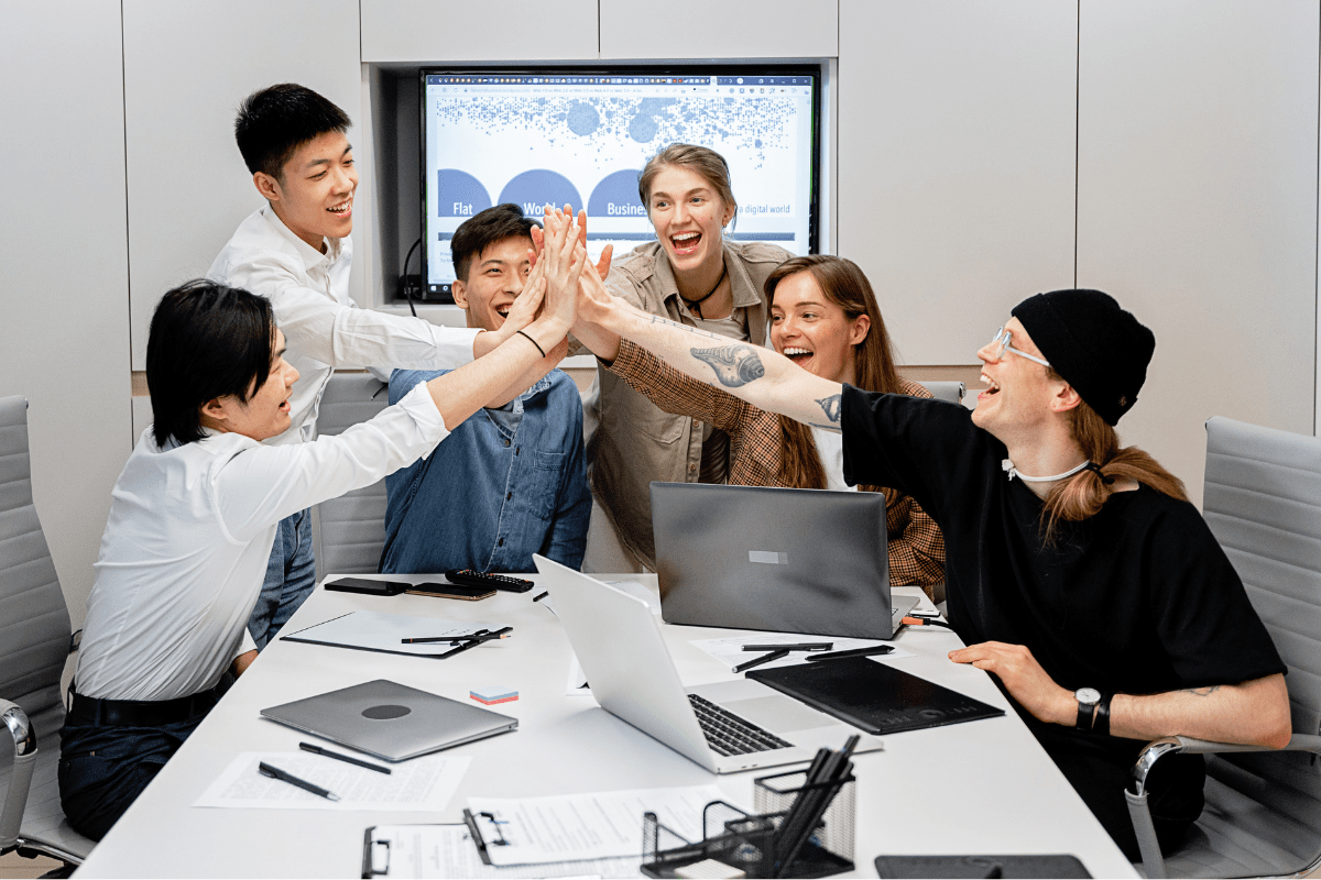 PCe Solutions Tampa IT team collaborating with a small business client representing the extended team model of managed IT services for Tampa Bay Florida businesses across Hillsborough Pinellas and Pasco counties