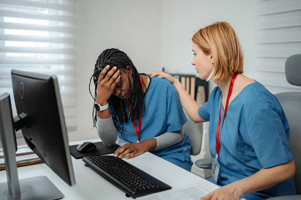 Overwhelmed Tampa healthcare administrative staff representing the hidden cost of AI inaction in Tampa Bay healthcare organizations across Hillsborough and Pinellas counties served by PCe Solutions Managed Intelligence AI services