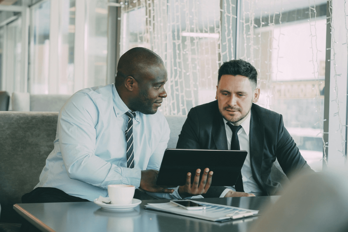 Tampa business professional reviewing cybersecurity compliance and security posture information in a Westshore corridor office setting representing PCe Solutions cybersecurity services for financial services healthcare and legal organizations across Tampa Bay Florida