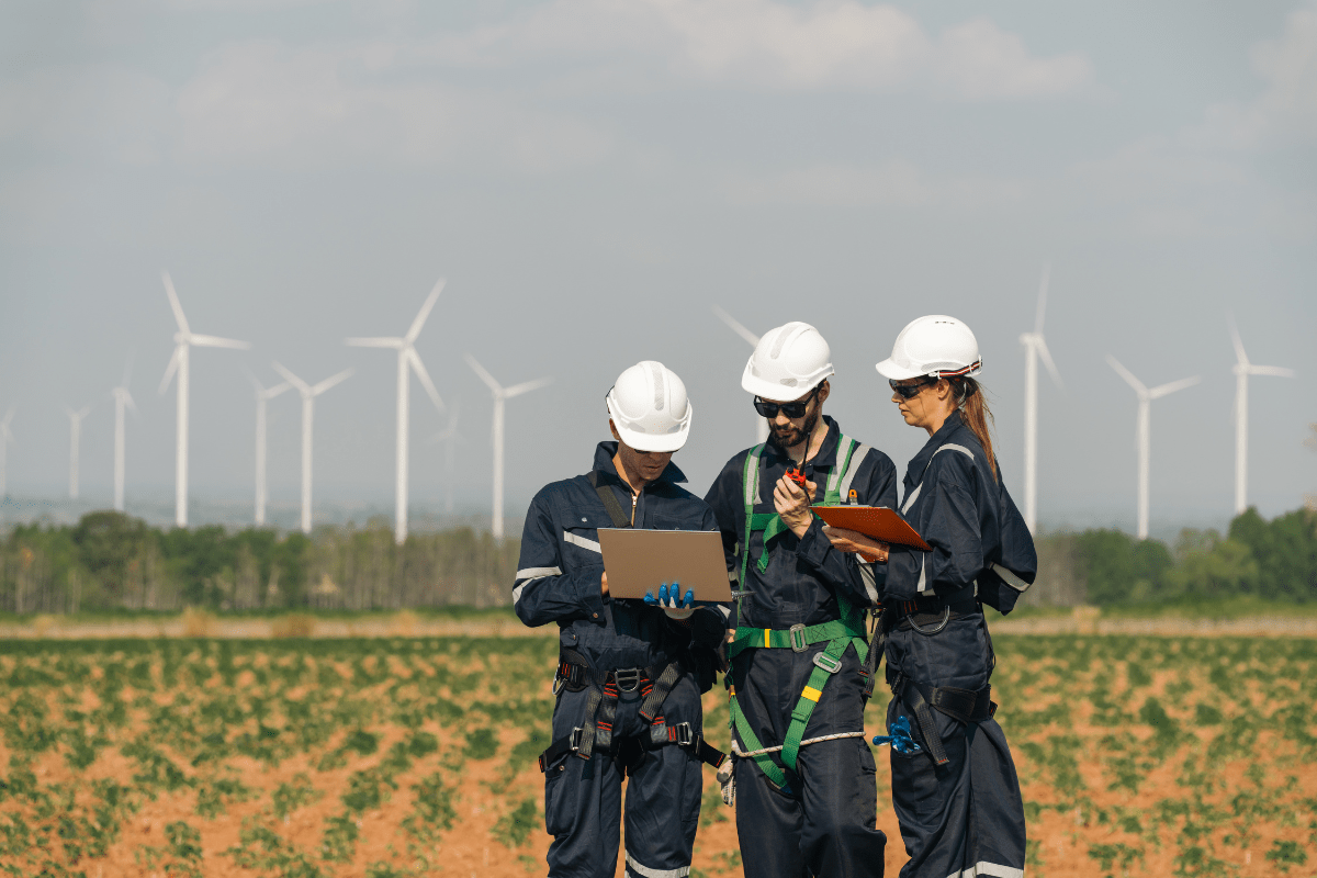 Calgary energy services company operations manager reviewing field site connectivity and technology options with a consultant representing PCe Solutions IT Consulting and Strategy engagement process for Calgary Alberta businesses