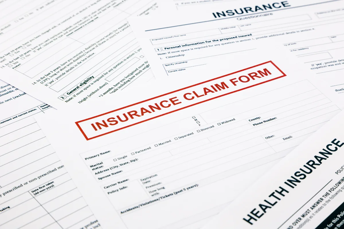 Cyber insurance Tampa business owner reading a denied claim letter after a breach representing PCe Solutions cybersecurity readiness services across Tampa Bay Florida